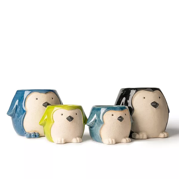 Suporturi de lumânări din ceramică în formă de pinguin